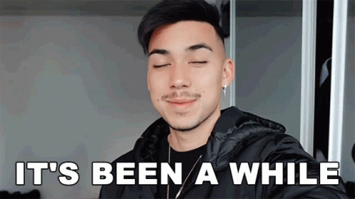 Man Smiling With Eyes Closed Says Been A While GIF