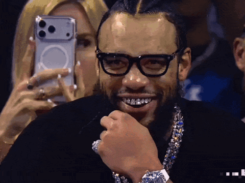 Man Smiling with Glasses and Watch