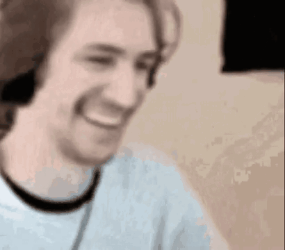 Man Smiling With Headphones