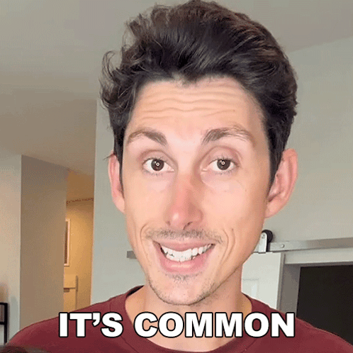 Man Smiling With It's Common Above His Face GIF