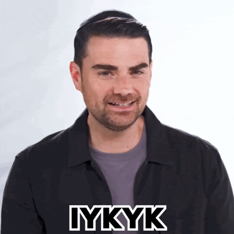 Man Smiling With IYKYK GIF