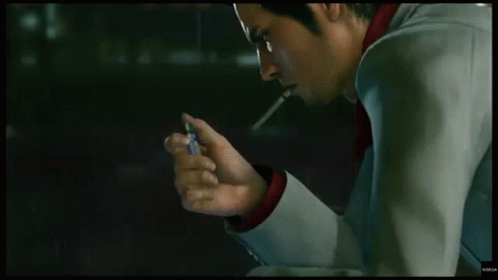 Man Smoking Cigarette With Lighter GIF