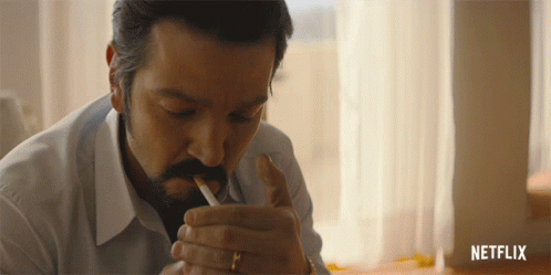 Man Smoking Cigarette with Netflix Logo