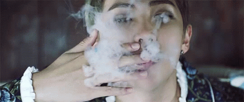 Man Smoking Cigarette With Smoke