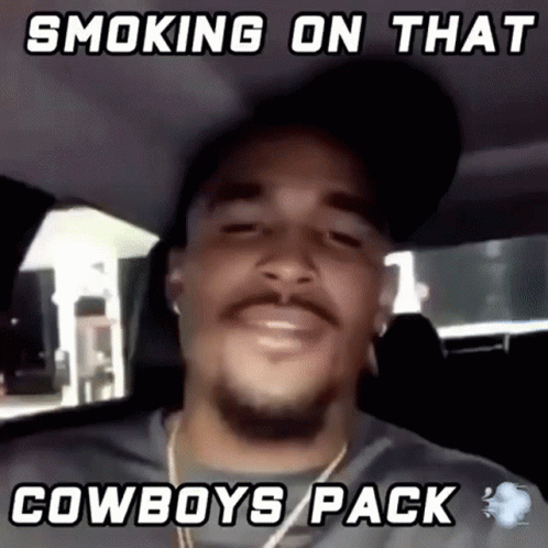 Man Smoking Cowboys Pack In Car