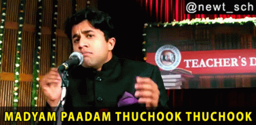 Man Speaking Into Microphone At Teacher's Day Sign GIF
