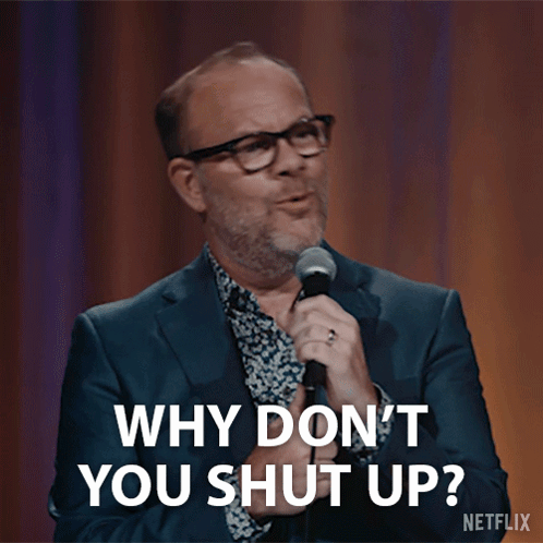 Man Speaking Into Microphone Saying Why Don't You Shut Up