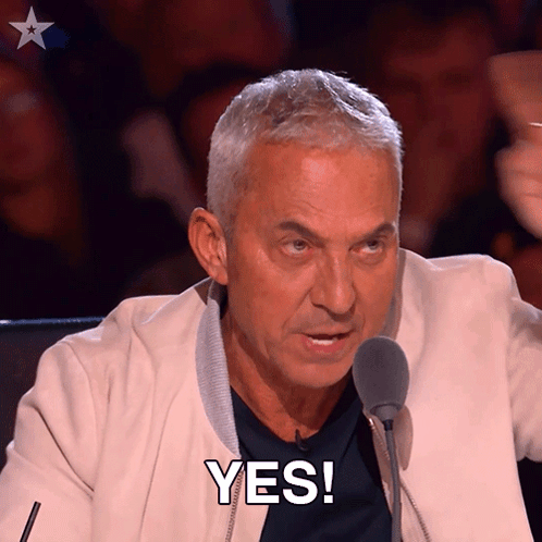 Man Speaking Into Microphone Saying Yes