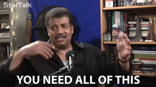 Man Speaking Into Microphone Saying You Need All Of This GIF
