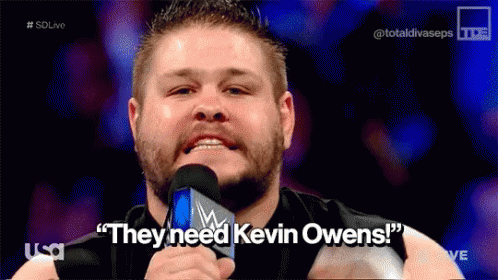 Man Speaking Into Microphone They Need Kevin Owens