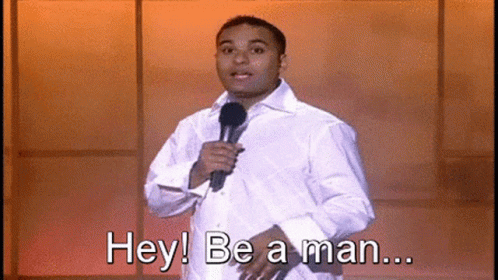 Man Speaking On Mic Hey Be A Man GIF