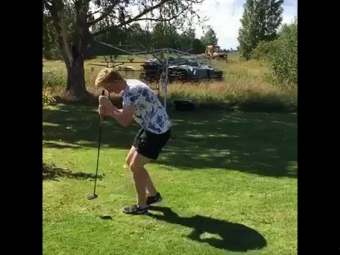 Man Spinning With Golf Club GIF