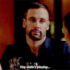 Man Spreading Sarcasm With Worlds Smallest Violin GIF