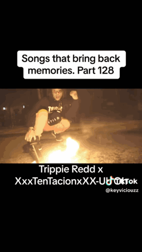 Man Squatting By Fire Saying Songs That Bring Back Memories GIF