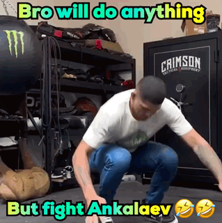 Man Squatting in Front of Safe Saying Crimson