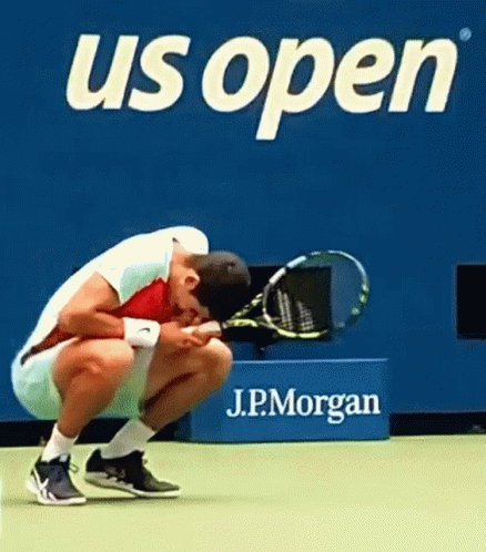 Man Squatting On Tennis Court GIF