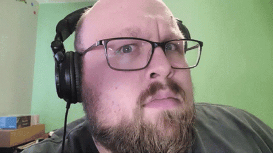 Man Squint Look With Glasses GIF