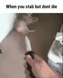 Man Stabbing Dog With Toy Knife GIF