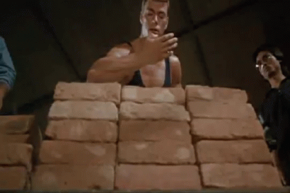 Man Stacking Bricks