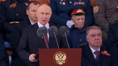 Man Standing at Ura Podium