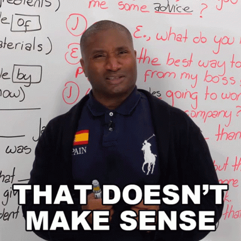 Man Standing at Whiteboard Saying That Doesn't Make Sense
