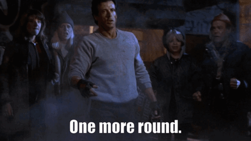 Man Standing Before Crowd One More Round