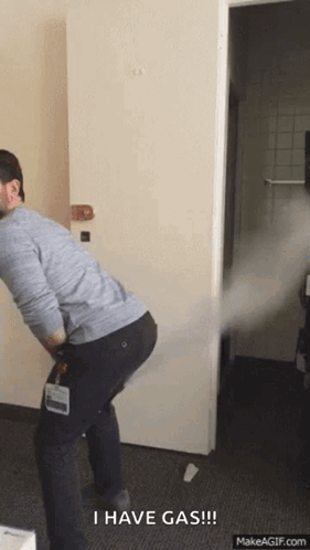 Man Standing Before Door With I Have Gas