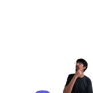 Man Standing Before Joker Card