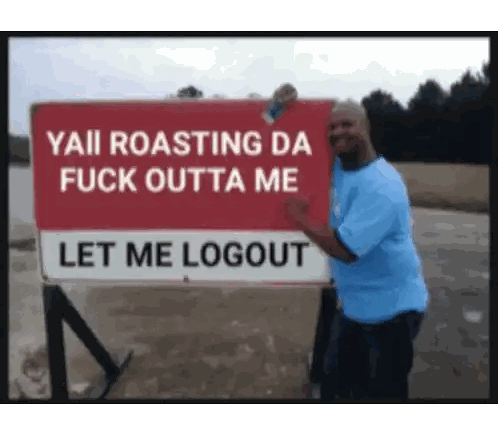 Man Standing Before Red Sign Yaii Roasting