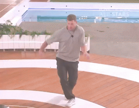 Man Standing by Pool Saying All Stars