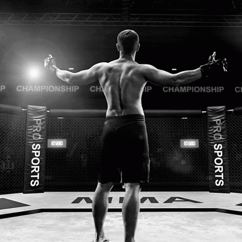 Man Standing in Boxing Ring