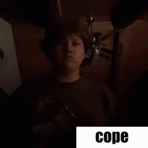 Man Standing In Dark Room Saying Cope GIF