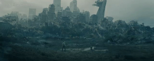 Man Standing in Earthquake-Damaged City