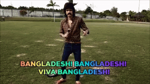 Man Standing In Field With Bangladeshi Words GIF
