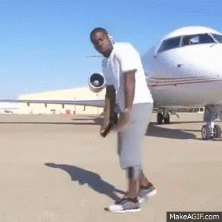 Man Standing In Front Of Airplane GIF