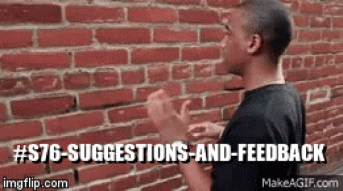 Man Standing in Front of Brick Wall with Suggestions and Feedback