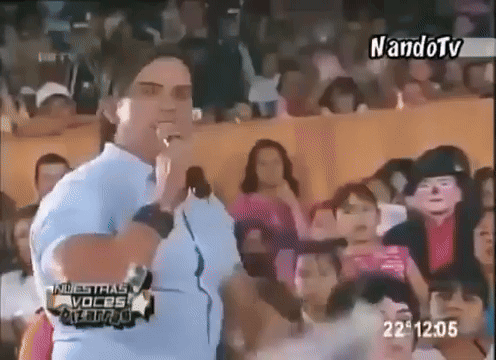Man Standing in Front of Crowd at 22:05