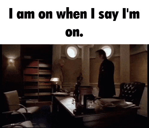Man Standing In Front Of Desk Saying I Am On GIF