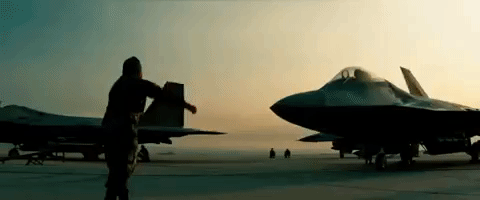 Man Standing In Front Of Fighter Jet GIF