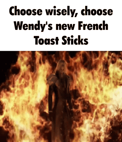Man Standing in Front of Fire Saying Choose Wisely