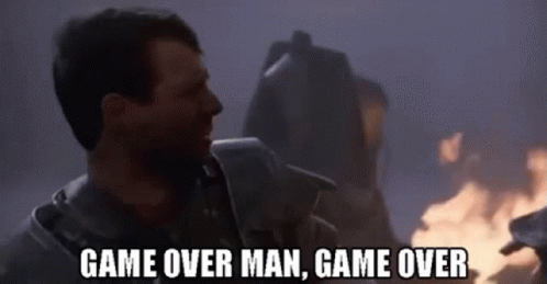 Man Standing in Front of Fire Says Game Over