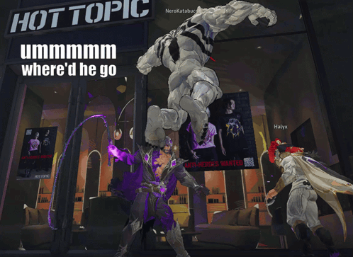 Man Standing in Front of Hot Topic