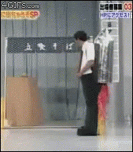 Man Standing in Front of HP Sign
