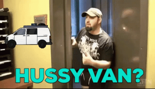 Man Standing in Front of Hussy Van