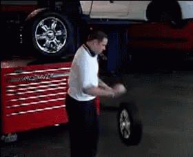Man Standing in Front of Mac Toolbox
