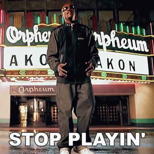Man Standing In Front Of Orpheum Theater GIF