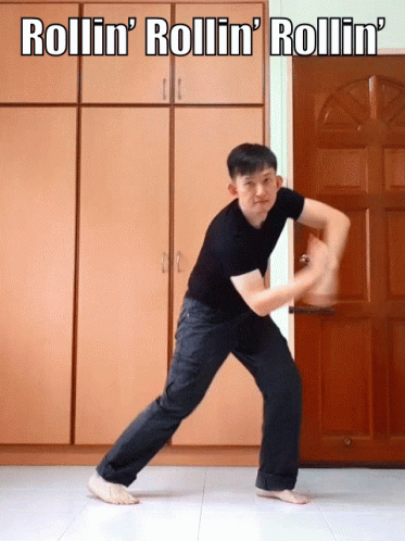 Man Standing in Front of Rollin' Door