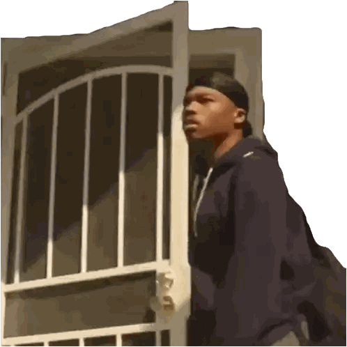Man Standing in Front of Screen Door