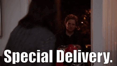 Man Standing in Front of Special Delivery Door