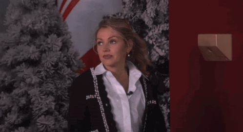 Man Standing In Front Of Talent Sign GIF